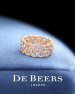 37.2 Paris - DEBEERS-CAMPAIGN-STILL-LIFE-ENCHANTED-LOTUS-BAND-RING-4x5-LOGO.jpg